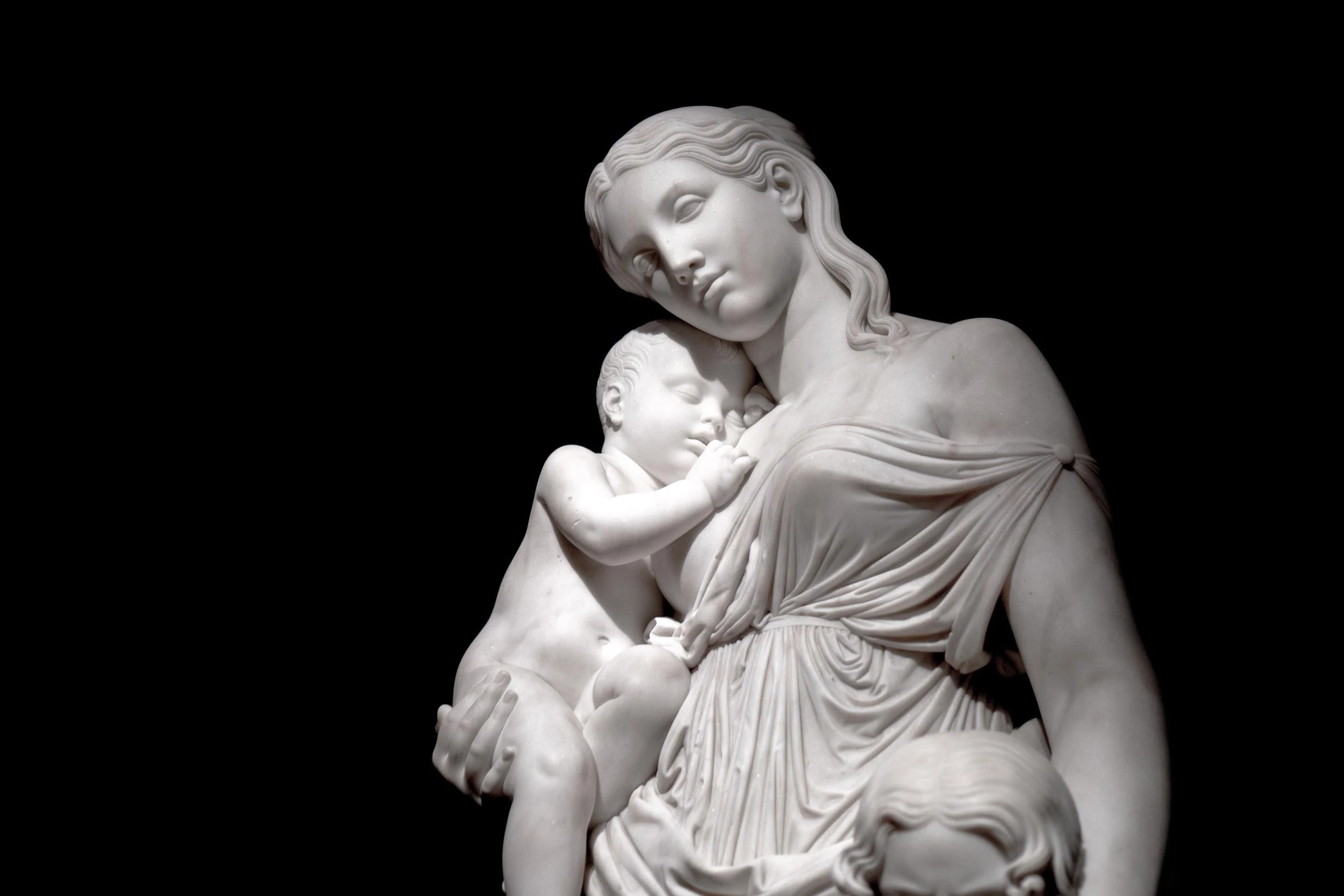 greek statue woman with kid