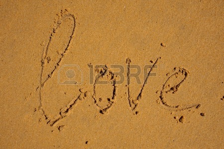 450x299 Love Word Drawn On The Beach Sand Stock Photo, Picture And Royalty