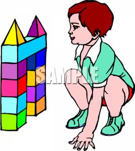 267x300 A Child Playing With Colored Building Blocks