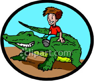 300x258 Boy Riding A Crocodile