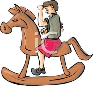 300x279 A Young Boy Riding On A Rocking Horse