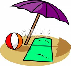 300x279 A Beach Towel And Ball Underneath An Umbrella