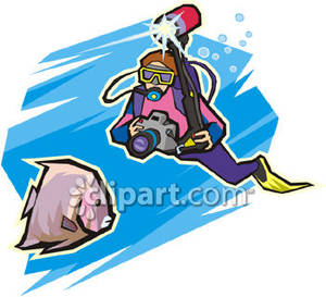 300x273 A Scuba Diver Taking Pictures Underwater