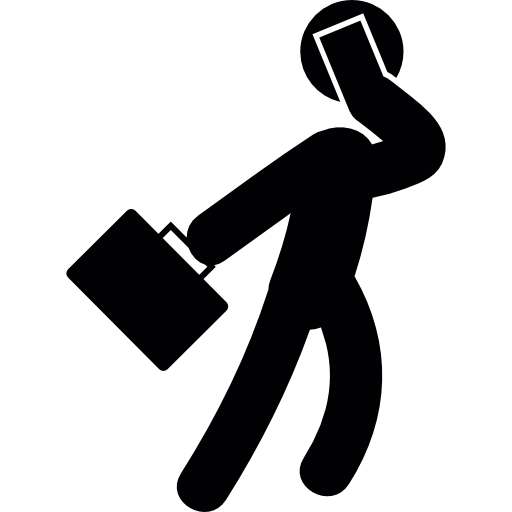 Businessman Walking With A Suitcase And Talking