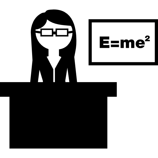 Teacher Sitting Behind Her School Class Desk Teaching Physics