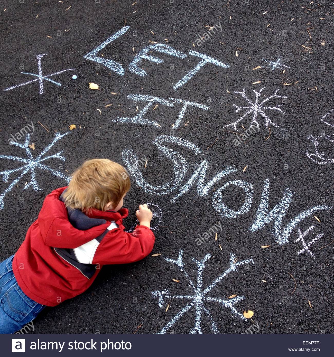 1300x1390 Boy Lying On Asphalt, Drawing With Chalk Stock Photo, Royalty Free