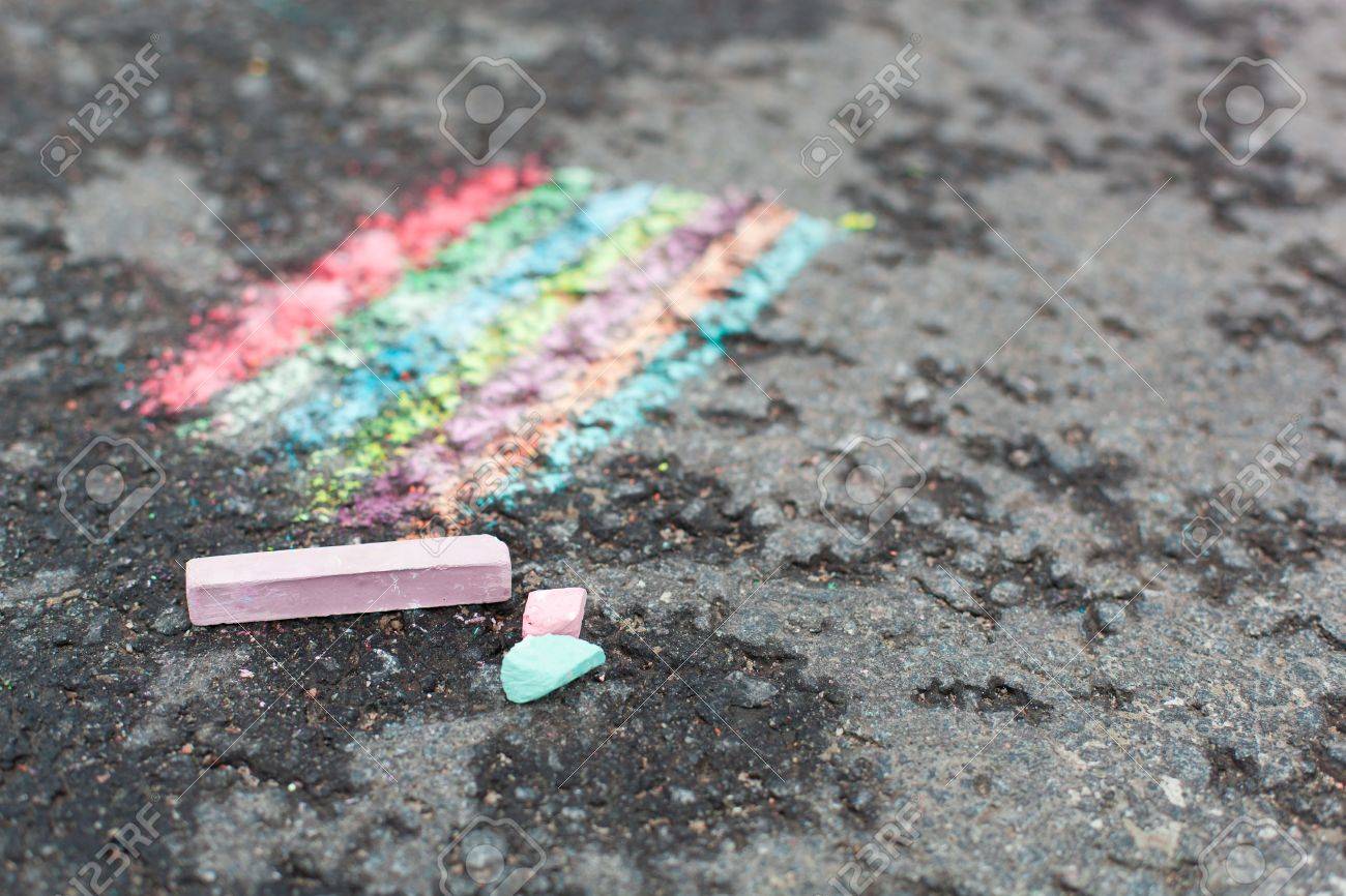 1300x866 Chalk Drawing Of Rainbow And Color Chalks On Asphalt Stock Photo