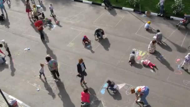 608x342 Children Start Drawing On Asphalt Drawings Stock Video Paha L
