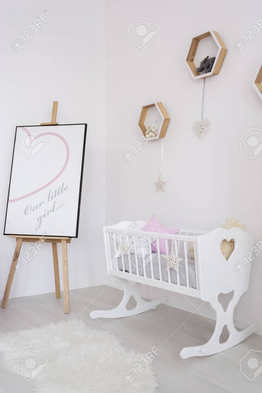 866x1300 Bright Interior With Stylish Baby Cradle And Easel With Heart