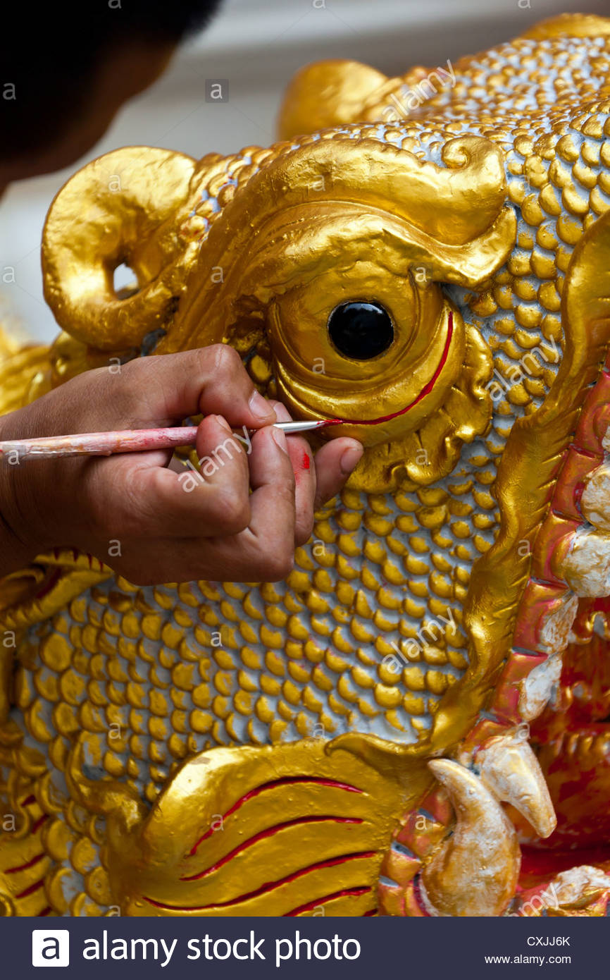 866x1390 Monk Drawing On A Dragon Statue In The Buddhist Temple Wat Phra