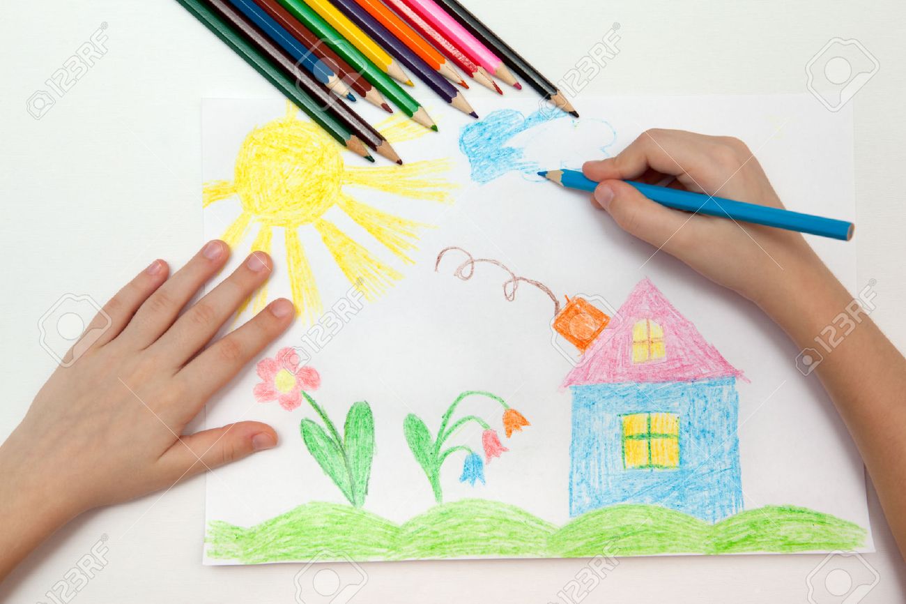 1300x866 Child Draws A Pencil Drawing Of The World Stock Photo, Picture