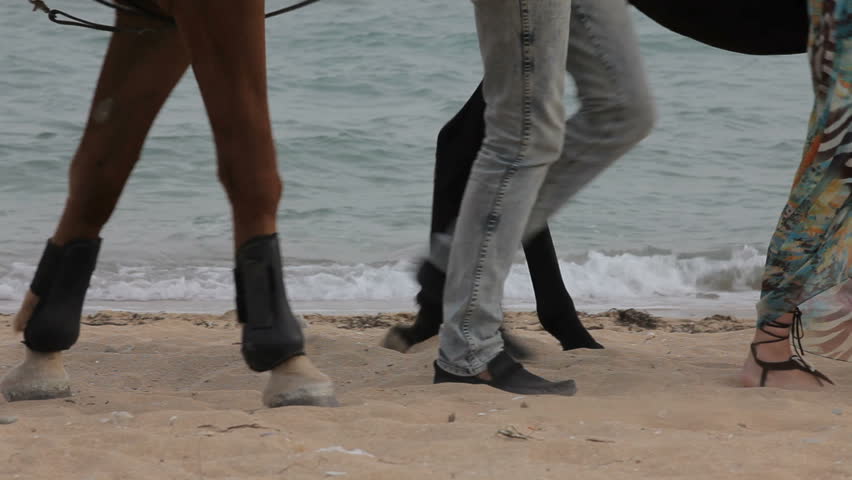 852x480 Pregnant Couple Having Fun On Beach. Feet Of Couple On Beach