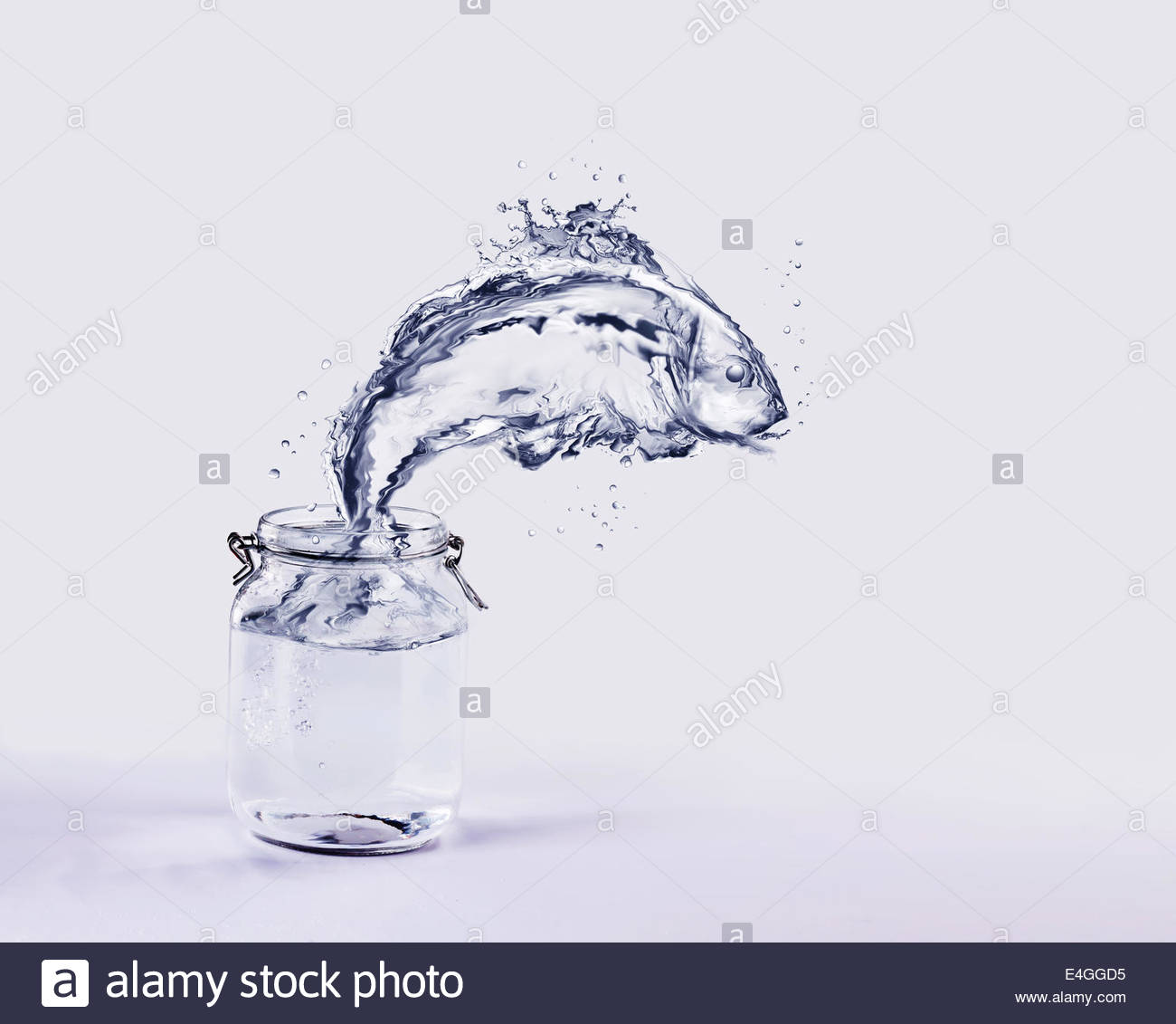 1300x1131 Water Fish Jumping Out Of Jar Stock Photo, Royalty Free Image