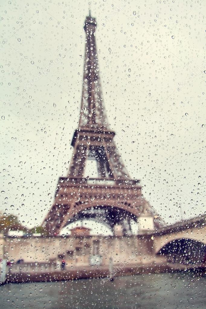 682x1023 View On The Eiffel Tower Through The Window With Rain Drops
