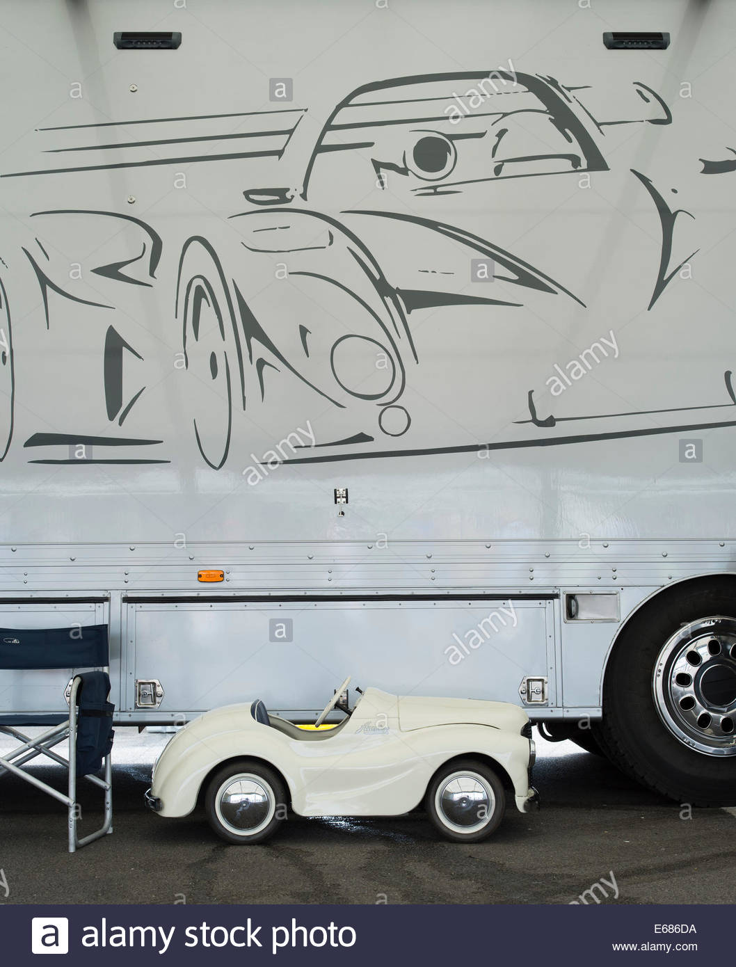 1058x1390 Toy Pedal Car In Front Of Race Car Design On The Side Of A Truck