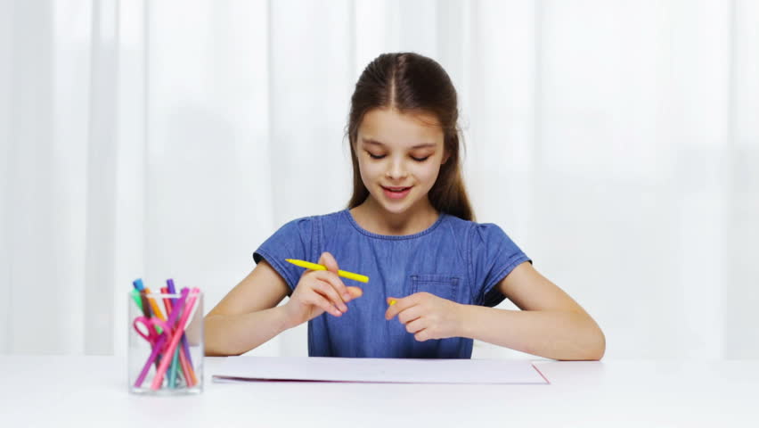 852x480 Little Asian Girl Drawing A Picture On The Table Stock Footage