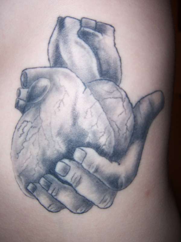 600x800 Hands Holding An Anatomical Heart Tattoo Hand Holding Heart