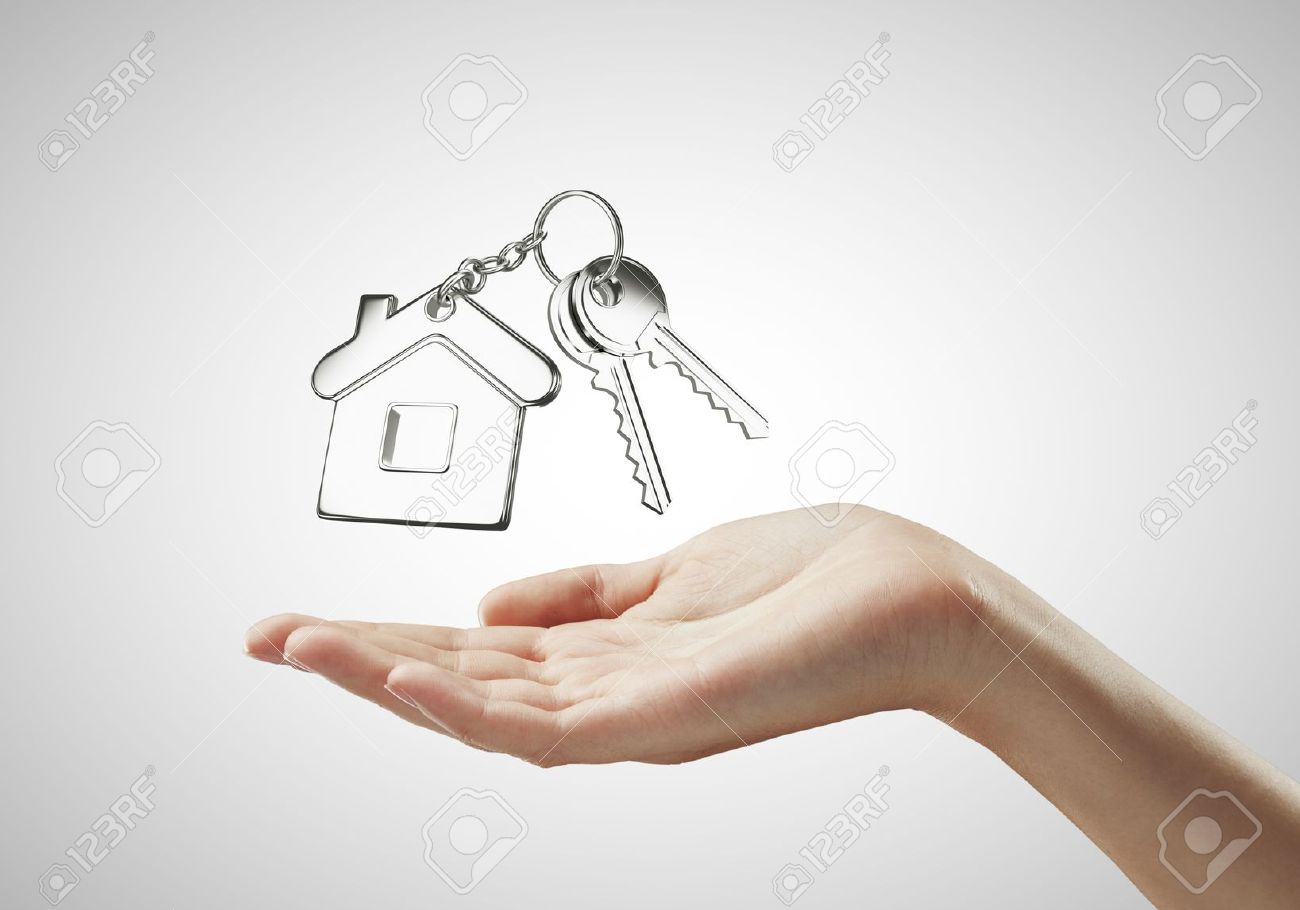 1300x910 Key With Key Chain On Hand On White Background Stock Photo