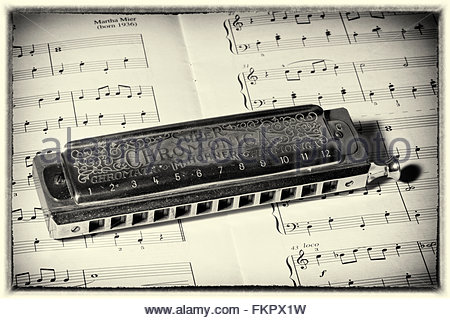 450x320 Harmonica And Sheet Music Stock Photo, Royalty Free Image