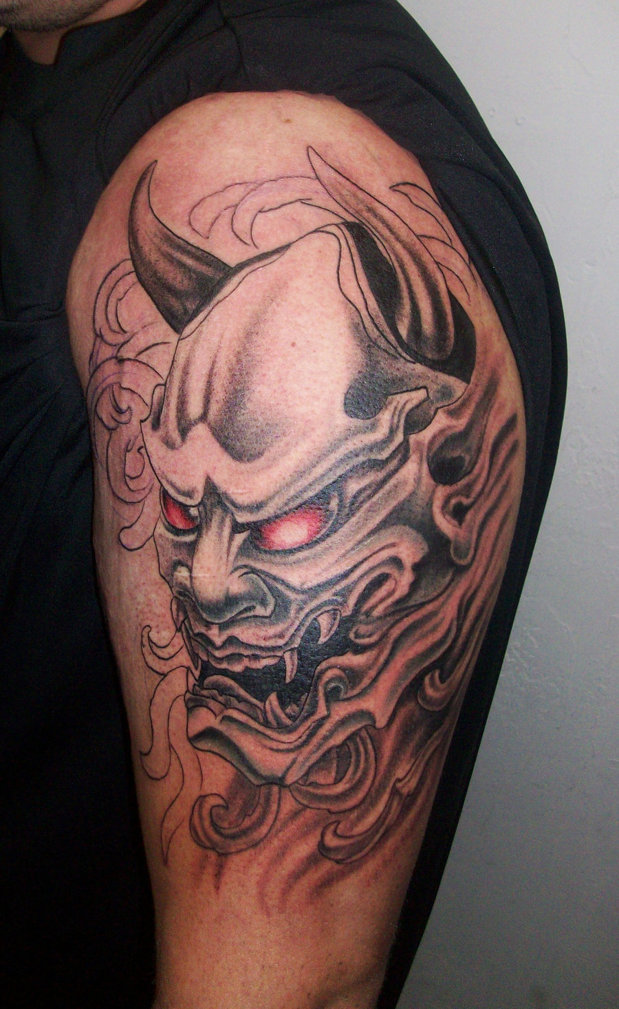 900x1466 35 Oni Mask Tattoos With Mysterious And Powerful Meanings
