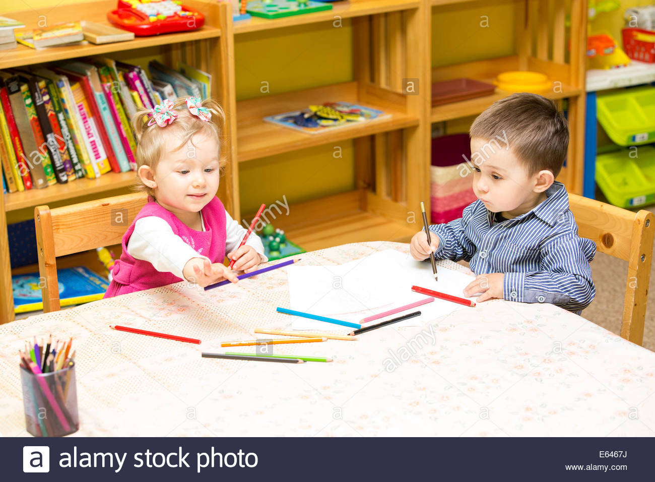 1300x956 Two Little Kids Drawing With Colorful Pencils In Preschool