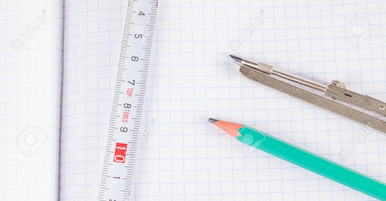 1300x676 Tools For Drawing And Measuring On A Sheet In A Cage Stock Photo