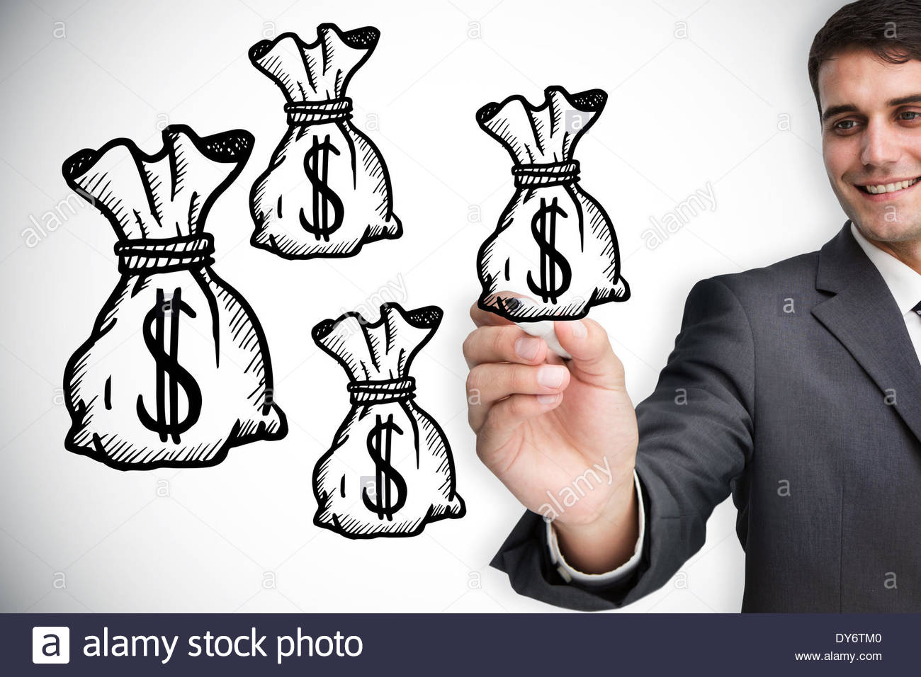 1300x956 Composite Image Of Businessman Drawing Money Bags Stock Photo