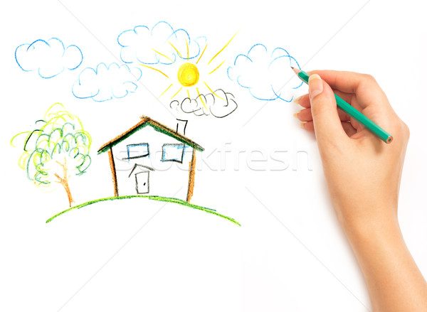 600x439 Woman's Hand Drawing The Dream Home Stock Photo Vladyslav