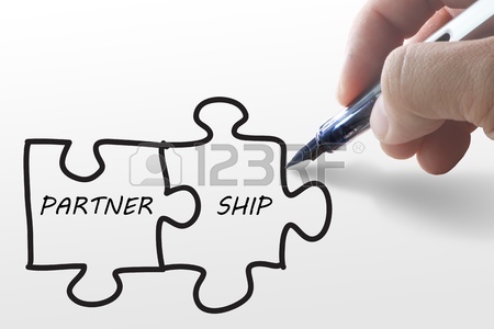 450x300 Partnership Written Puzzle Pieces In Hand Stock Photo, Picture