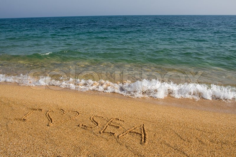 800x533 Simple Word I Love Sea Drawing In The Sand On The Beach. Stock
