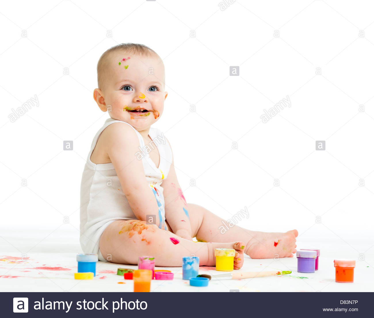 1300x1106 Smiling Baby Drawing With A Finger's Paints Stock Photo 56630890
