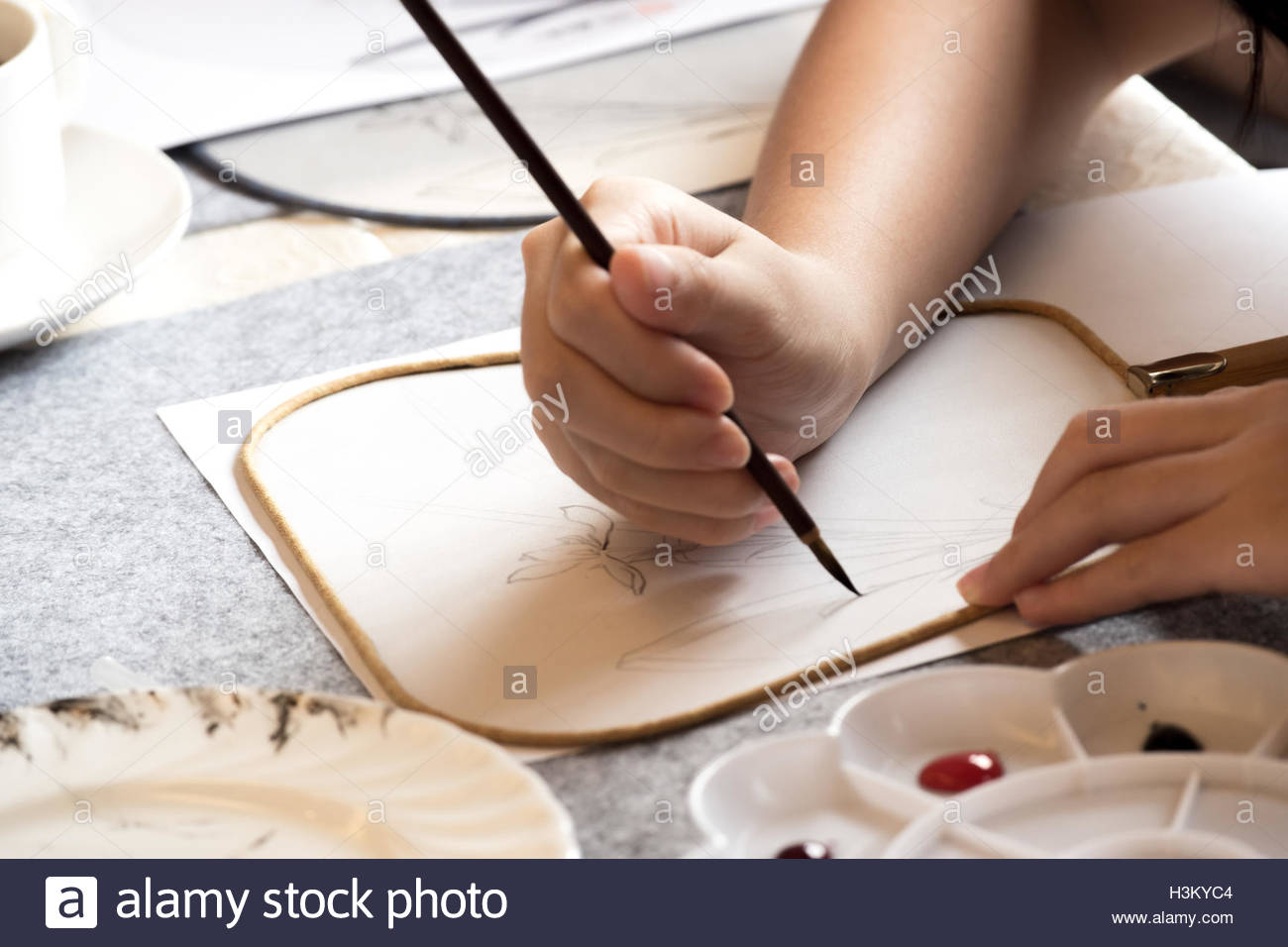 1300x956 Someone Drawing On Paper Fan Stock Photo 122755140