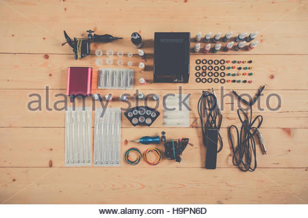 450x319 Tattoo Machine On The Background Of A Studio Stock Photo