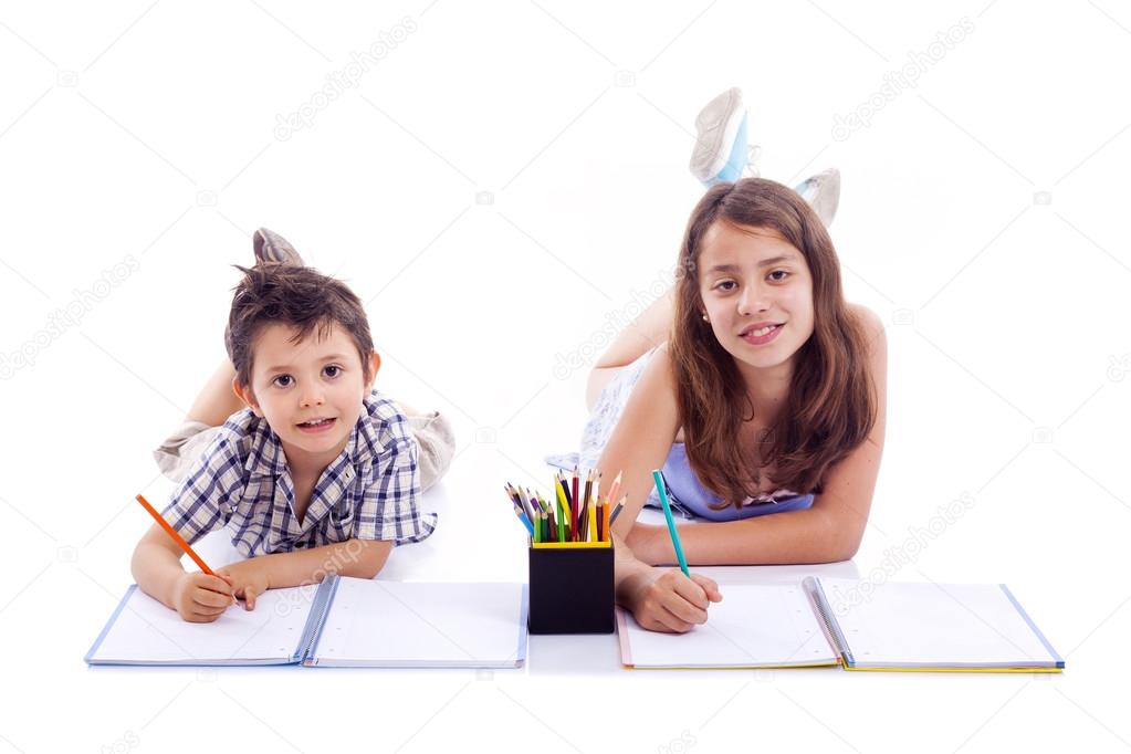 1023x682 Two Kids Drawing With Colored Pencils, Isolated On White Bakgrou
