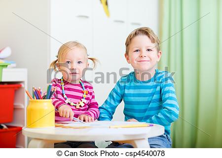 450x320 Two Kids Drawing With Coloring Pencils. Portrait Of Two