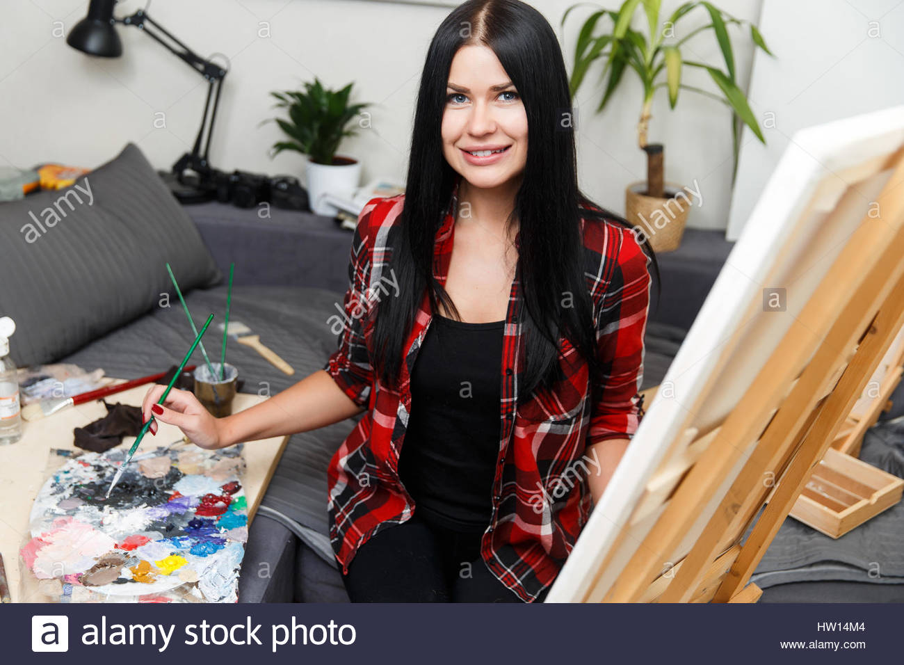 1300x956 Young Woman Drawing On Canvas Stock Photo 135864628