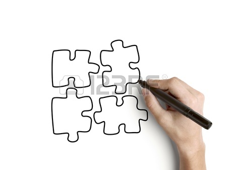 450x337 Hand Drawing Puzzles On Paper Stock Photo, Picture And Royalty