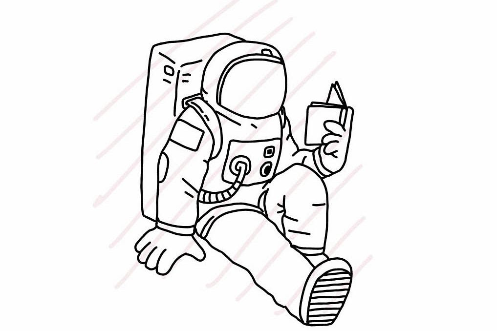 1017x678 Astronaut Sitting And Reading A Book