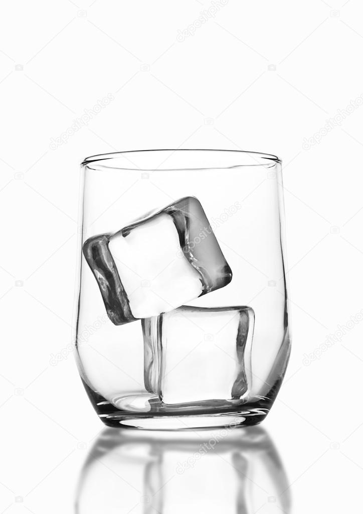 724x1024 Empty Whiskey Glass With Ice Cubes On White Stock Photo