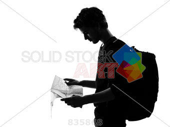 340x254 Stock Photo Of Young Man Silhouette Backpacker Reading Map