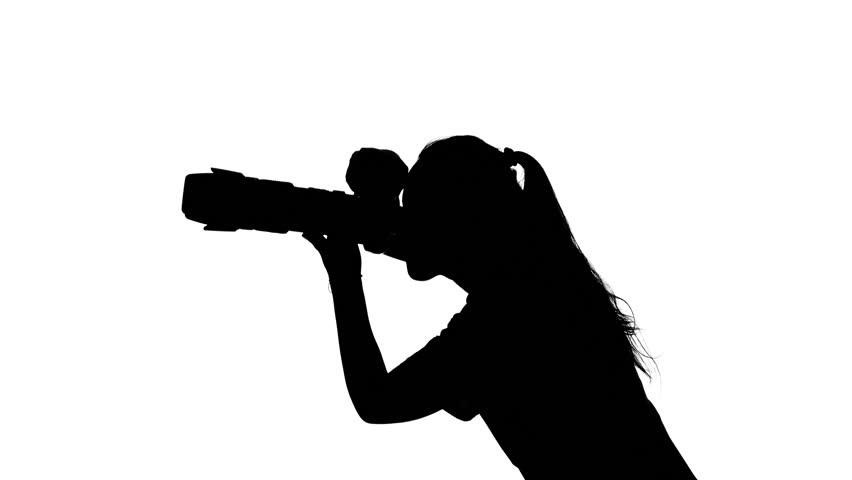 852x480 Photographer Works In The Studio. White. Silhouette Stock Footage