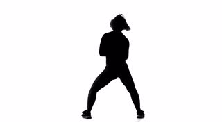 320x180 The Black Silhouette Of A Dancing Girl On A White Background Stock