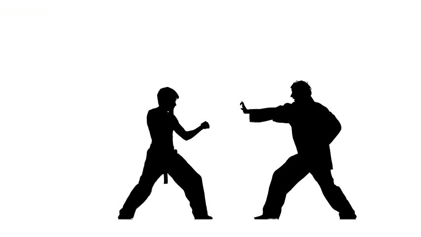 852x480 Costume Bruce Lee. The Young Man Expertly Twirling Nunchaku.on