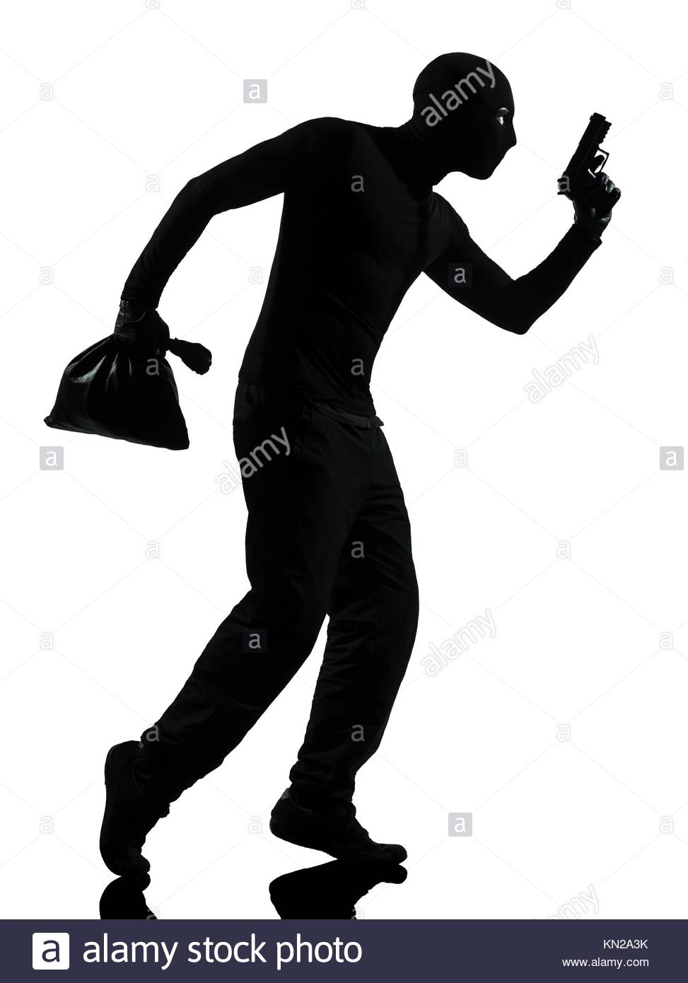 973x1390 Thief Criminal Holding Gun In Silhouette Studio Isolated On White