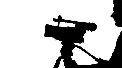 400x224 Silhouette Of A Cameraman Recording Digital Video Stock Footage