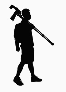 215x300 Silhouette Of Man Carrying Camera And Tripod. Royalty Free Stock