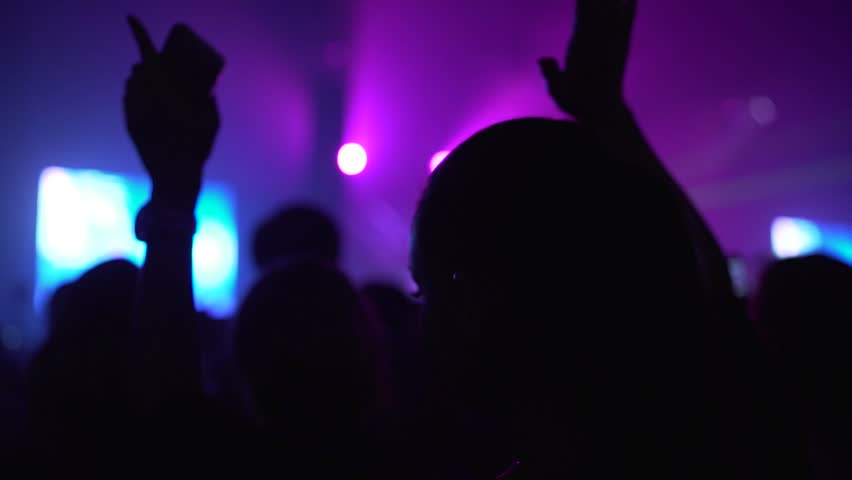 852x480 Girl Sitting On Shoulders At Concert In Crowd In Silhouette