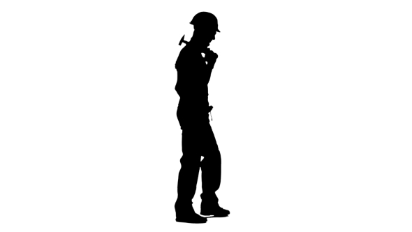 590x332 Silhouette Of Man Builder With Hammer In His Hands Goes To