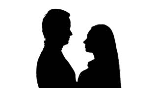 320x180 Silhouette Of A Romantic Couple Kissing. Close Up Shot. Stock