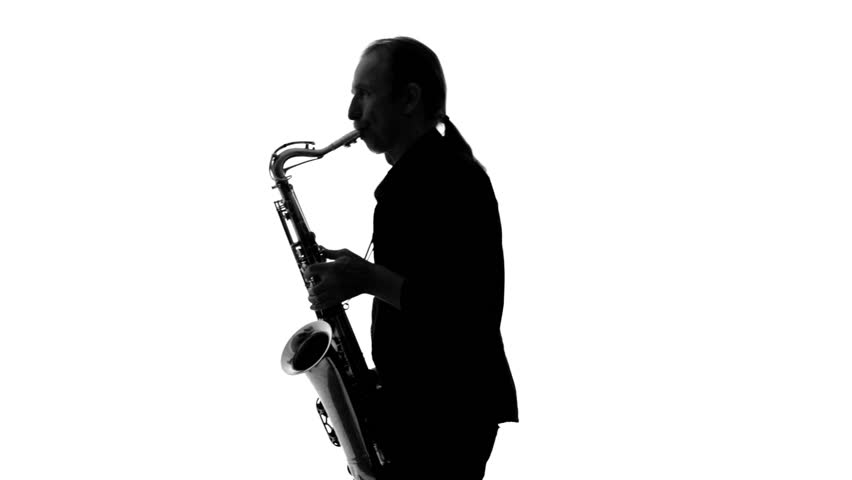 852x480 Close Up Of Dark Silhouette Of Saxophonist Playing His Musical